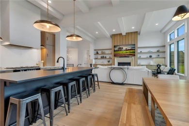 This incredible Werschay Homes masterpiece offers breathtaking on Blackberry Ridge Golf Club in Minnesota - for sale on GolfHomes.com, golf home, golf lot