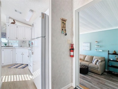 Step into this well-cared-for home where pride of ownership is on Lily Lake Golf and RV Resort in Florida - for sale on GolfHomes.com, golf home, golf lot