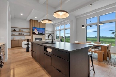 This incredible Werschay Homes masterpiece offers breathtaking on Blackberry Ridge Golf Club in Minnesota - for sale on GolfHomes.com, golf home, golf lot