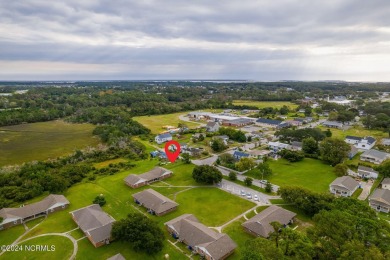 Endless possibilities are waiting with potential for waterviews on North River Club in North Carolina - for sale on GolfHomes.com, golf home, golf lot