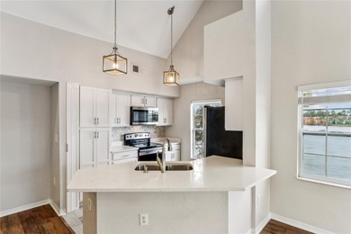 STUNNING and MOVE-IN READY LAKEFRONT condo in Lake Chase, where on Westchase Golf Club in Florida - for sale on GolfHomes.com, golf home, golf lot