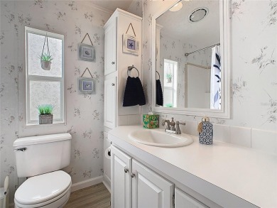 Step into this well-cared-for home where pride of ownership is on Lily Lake Golf and RV Resort in Florida - for sale on GolfHomes.com, golf home, golf lot
