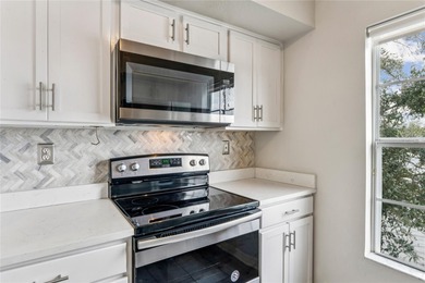 STUNNING and MOVE-IN READY LAKEFRONT condo in Lake Chase, where on Westchase Golf Club in Florida - for sale on GolfHomes.com, golf home, golf lot