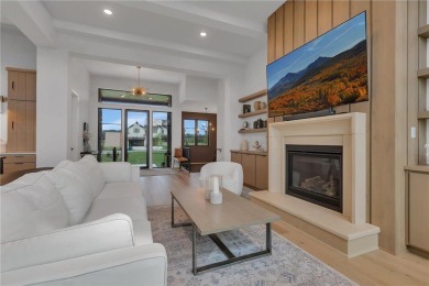 This incredible Werschay Homes masterpiece offers breathtaking on Blackberry Ridge Golf Club in Minnesota - for sale on GolfHomes.com, golf home, golf lot