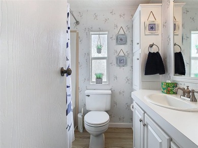 Step into this well-cared-for home where pride of ownership is on Lily Lake Golf and RV Resort in Florida - for sale on GolfHomes.com, golf home, golf lot