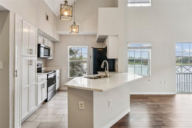 STUNNING and MOVE-IN READY LAKEFRONT condo in Lake Chase, where on Westchase Golf Club in Florida - for sale on GolfHomes.com, golf home, golf lot