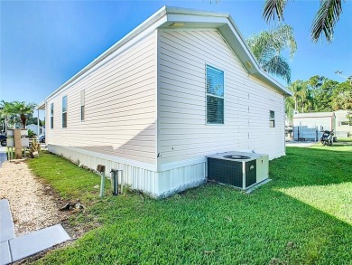 Step into this well-cared-for home where pride of ownership is on Lily Lake Golf and RV Resort in Florida - for sale on GolfHomes.com, golf home, golf lot