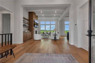 This incredible Werschay Homes masterpiece offers breathtaking on Blackberry Ridge Golf Club in Minnesota - for sale on GolfHomes.com, golf home, golf lot