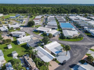 Step into this well-cared-for home where pride of ownership is on Lily Lake Golf and RV Resort in Florida - for sale on GolfHomes.com, golf home, golf lot
