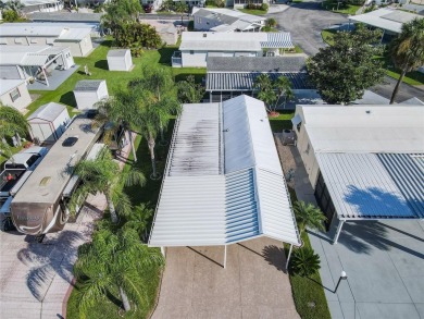 Step into this well-cared-for home where pride of ownership is on Lily Lake Golf and RV Resort in Florida - for sale on GolfHomes.com, golf home, golf lot