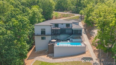MOTIVATED SELLER.....HOME IN HORSESHOE BEND HAS POTENTIAL TO BE on Seasons Ridge At Four Seasons in Missouri - for sale on GolfHomes.com, golf home, golf lot