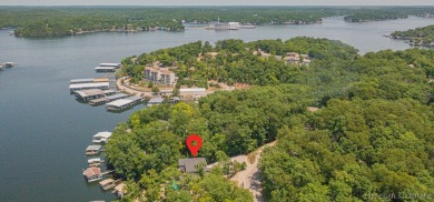 MOTIVATED SELLER.....HOME IN HORSESHOE BEND HAS POTENTIAL TO BE on Seasons Ridge At Four Seasons in Missouri - for sale on GolfHomes.com, golf home, golf lot