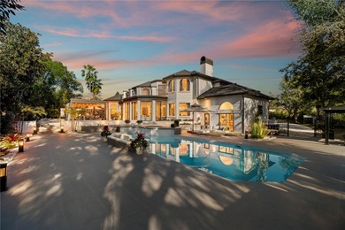 Presenting a newly remodeled luxury estate ideally positioned on Isleworth Golf and Country Club in Florida - for sale on GolfHomes.com, golf home, golf lot