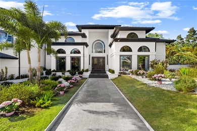 Presenting a newly remodeled luxury estate ideally positioned on Isleworth Golf and Country Club in Florida - for sale on GolfHomes.com, golf home, golf lot