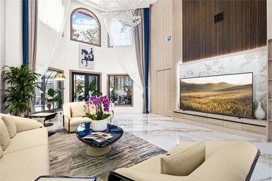 Presenting a newly remodeled luxury estate ideally positioned on Isleworth Golf and Country Club in Florida - for sale on GolfHomes.com, golf home, golf lot