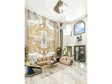 Presenting a newly remodeled luxury estate ideally positioned on Isleworth Golf and Country Club in Florida - for sale on GolfHomes.com, golf home, golf lot