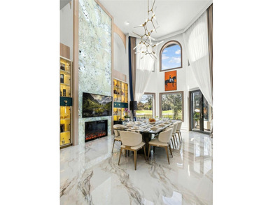 Presenting a newly remodeled luxury estate ideally positioned on Isleworth Golf and Country Club in Florida - for sale on GolfHomes.com, golf home, golf lot