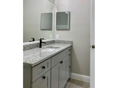 Beautiful remodeled ground floor apartment, with laminate on Southern Dunes Golf and Country Club in Florida - for sale on GolfHomes.com, golf home, golf lot