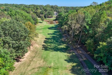 Rare find in Fort Mill! This vacant lot is the perfect canvas on Tega Cay Golf Club in South Carolina - for sale on GolfHomes.com, golf home, golf lot
