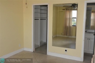 Retirement living at its finest! This stunning, updated 2/2 unit on Sunrise Lakes Phase IV Golf Course in Florida - for sale on GolfHomes.com, golf home, golf lot