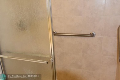 Retirement living at its finest! This stunning, updated 2/2 unit on Sunrise Lakes Phase IV Golf Course in Florida - for sale on GolfHomes.com, golf home, golf lot