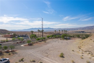 Gateway commercial property to Desert Foothills Master Planned on  in Arizona - for sale on GolfHomes.com, golf home, golf lot