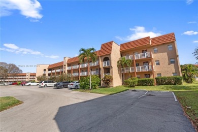Imagine stepping out your front door and being just steps away on Sunrise Lakes Phase III in Florida - for sale on GolfHomes.com, golf home, golf lot
