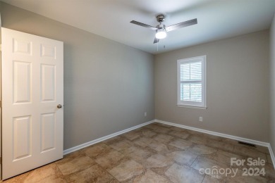 Welcome to this inviting 3-bedroom, 2.5-bathroom townhouse on Hampton Heights Golf Club in North Carolina - for sale on GolfHomes.com, golf home, golf lot