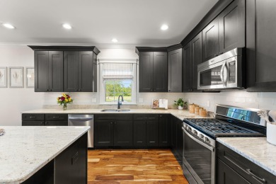 This stunning Colonial Revival home with Georgian influence on Sand Creek Golf and Country Club  in Indiana - for sale on GolfHomes.com, golf home, golf lot