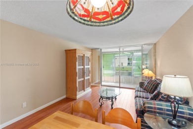 Imagine stepping out your front door and being just steps away on Sunrise Lakes Phase III in Florida - for sale on GolfHomes.com, golf home, golf lot