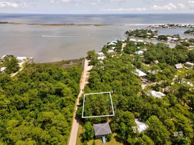 Fall in love with this large corner lot located on the corner of on Isle Dauphine Club Golf Course in Alabama - for sale on GolfHomes.com, golf home, golf lot