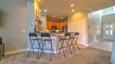 Welcome to this beautifully maintained 2-story townhome located on Eagle Creek Golf Club in Florida - for sale on GolfHomes.com, golf home, golf lot