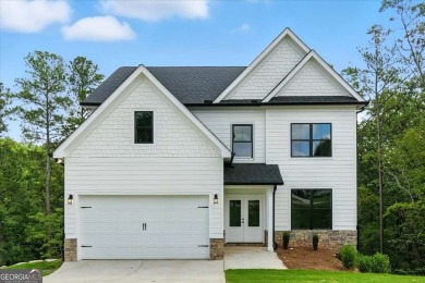 Welcome Home to 29 Creekview Drive! This stunning Alexander on The Plantation Golf Club in Georgia - for sale on GolfHomes.com, golf home, golf lot