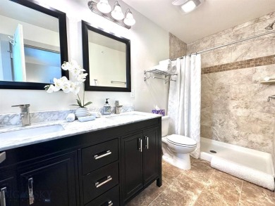 This pristine 3-bedroom condo has the best location in the on Big Sky of Montana Golf Course in Montana - for sale on GolfHomes.com, golf home, golf lot