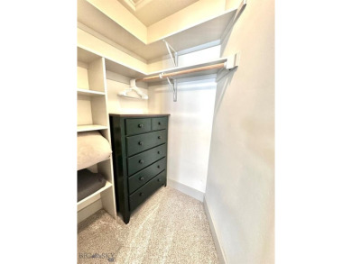 This pristine 3-bedroom condo has the best location in the on Big Sky of Montana Golf Course in Montana - for sale on GolfHomes.com, golf home, golf lot