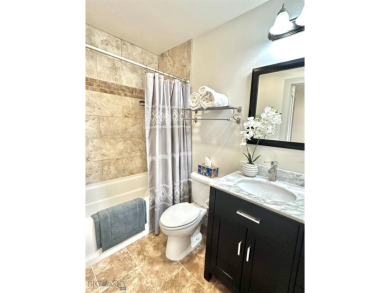 This pristine 3-bedroom condo has the best location in the on Big Sky of Montana Golf Course in Montana - for sale on GolfHomes.com, golf home, golf lot