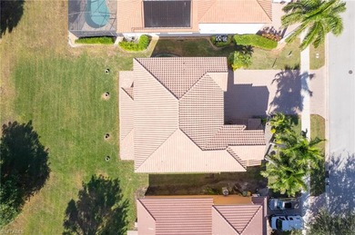 Welcome to 2135 Par Dr., a gorgeous 4-bedroom plus den, 4-bath on Valencia Golf and Country Club in Florida - for sale on GolfHomes.com, golf home, golf lot