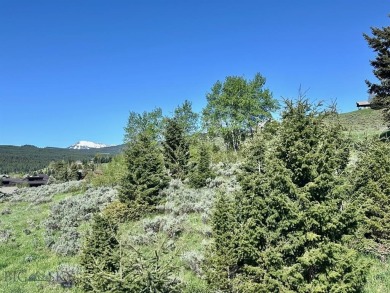 This pristine 3-bedroom condo has the best location in the on Big Sky of Montana Golf Course in Montana - for sale on GolfHomes.com, golf home, golf lot