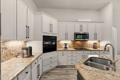 This elegant and inviting 5BR/4BA home is surrounded by lush on Plantation at Ponte Vedra in Florida - for sale on GolfHomes.com, golf home, golf lot