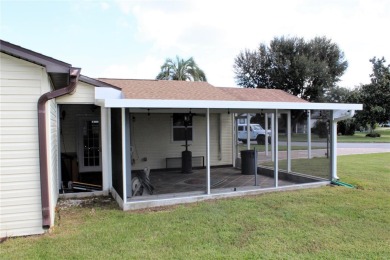 Charming 3-Bed, 3-Bath Home in Lady Lake Orange Blossom Gardens on Orange Blossom Hills Golf and Country Club in Florida - for sale on GolfHomes.com, golf home, golf lot