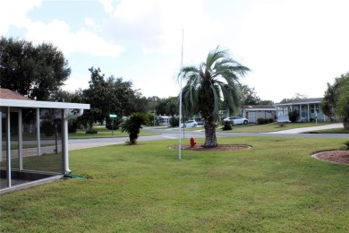 Charming 3-Bed, 3-Bath Home in Lady Lake Orange Blossom Gardens on Orange Blossom Hills Golf and Country Club in Florida - for sale on GolfHomes.com, golf home, golf lot