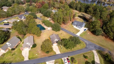 Lovely patio home situated on a quiet street in the gated on Players Course At Wyboo Plantation in South Carolina - for sale on GolfHomes.com, golf home, golf lot