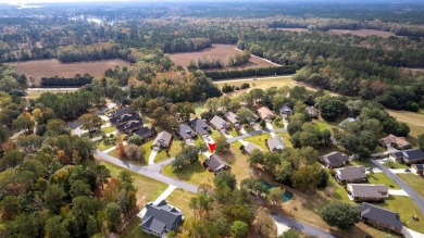 Lovely patio home situated on a quiet street in the gated on Players Course At Wyboo Plantation in South Carolina - for sale on GolfHomes.com, golf home, golf lot