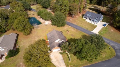 Lovely patio home situated on a quiet street in the gated on Players Course At Wyboo Plantation in South Carolina - for sale on GolfHomes.com, golf home, golf lot