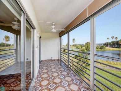 BRAND NEW VINYL FLOORING, NEVER-USED TOP-LINE SS APPLIANCES W/ on Wynmoor Golf Course in Florida - for sale on GolfHomes.com, golf home, golf lot