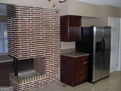 Fixer Upper opportunity in the desirable East Lake area! Solid on East Lake Golf Club in Georgia - for sale on GolfHomes.com, golf home, golf lot