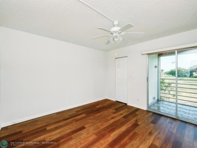BRAND NEW VINYL FLOORING, NEVER-USED TOP-LINE SS APPLIANCES W/ on Wynmoor Golf Course in Florida - for sale on GolfHomes.com, golf home, golf lot