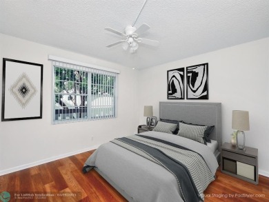 BRAND NEW VINYL FLOORING, NEVER-USED TOP-LINE SS APPLIANCES W/ on Wynmoor Golf Course in Florida - for sale on GolfHomes.com, golf home, golf lot