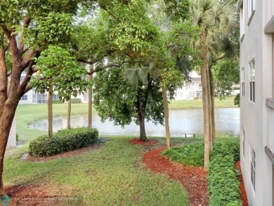 BRAND NEW VINYL FLOORING, NEVER-USED TOP-LINE SS APPLIANCES W/ on Wynmoor Golf Course in Florida - for sale on GolfHomes.com, golf home, golf lot