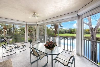SPECTACULAR!! This beautiful End Unit, SOLD TURNKEY, overlooks on Bonita Bay West in Florida - for sale on GolfHomes.com, golf home, golf lot